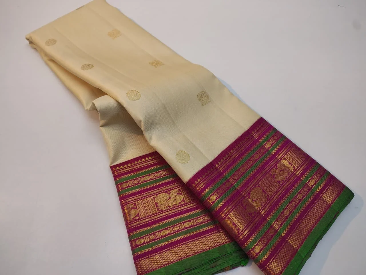 Magenta Zari Border and Woven Motifs Saree